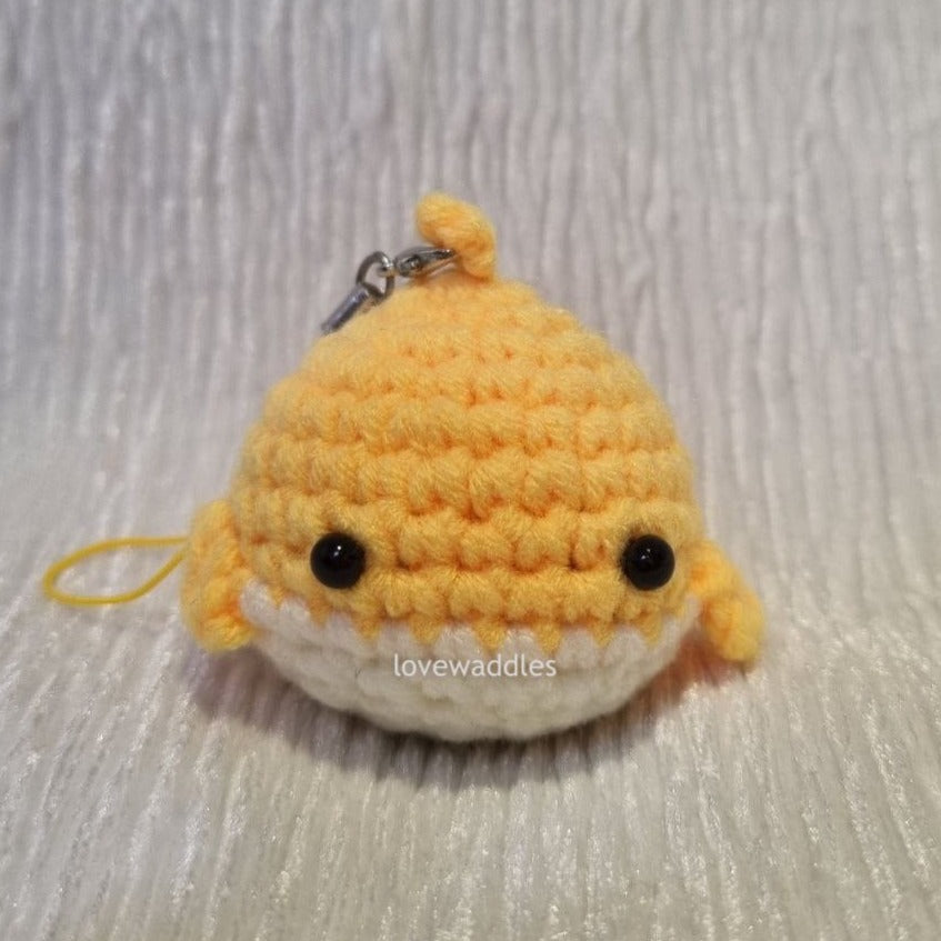 Yellow whale crochet front view. 