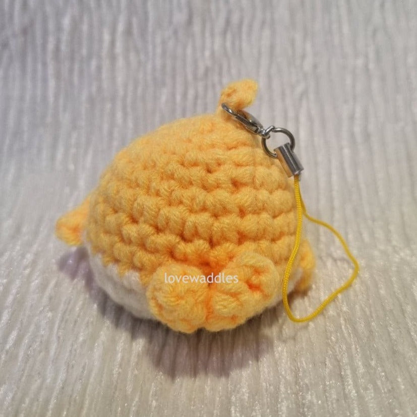 Yellow whale crochet back view. 