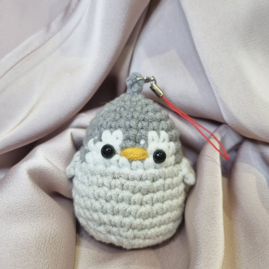 Grey crochet penguin front view 