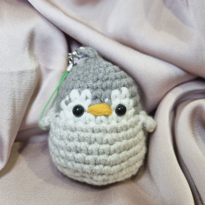 Grey crochet penguin front view 