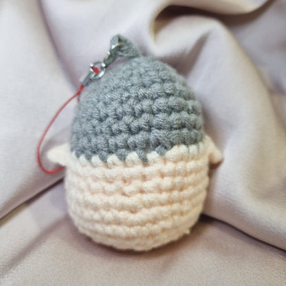 Cream crochet penguin back view 