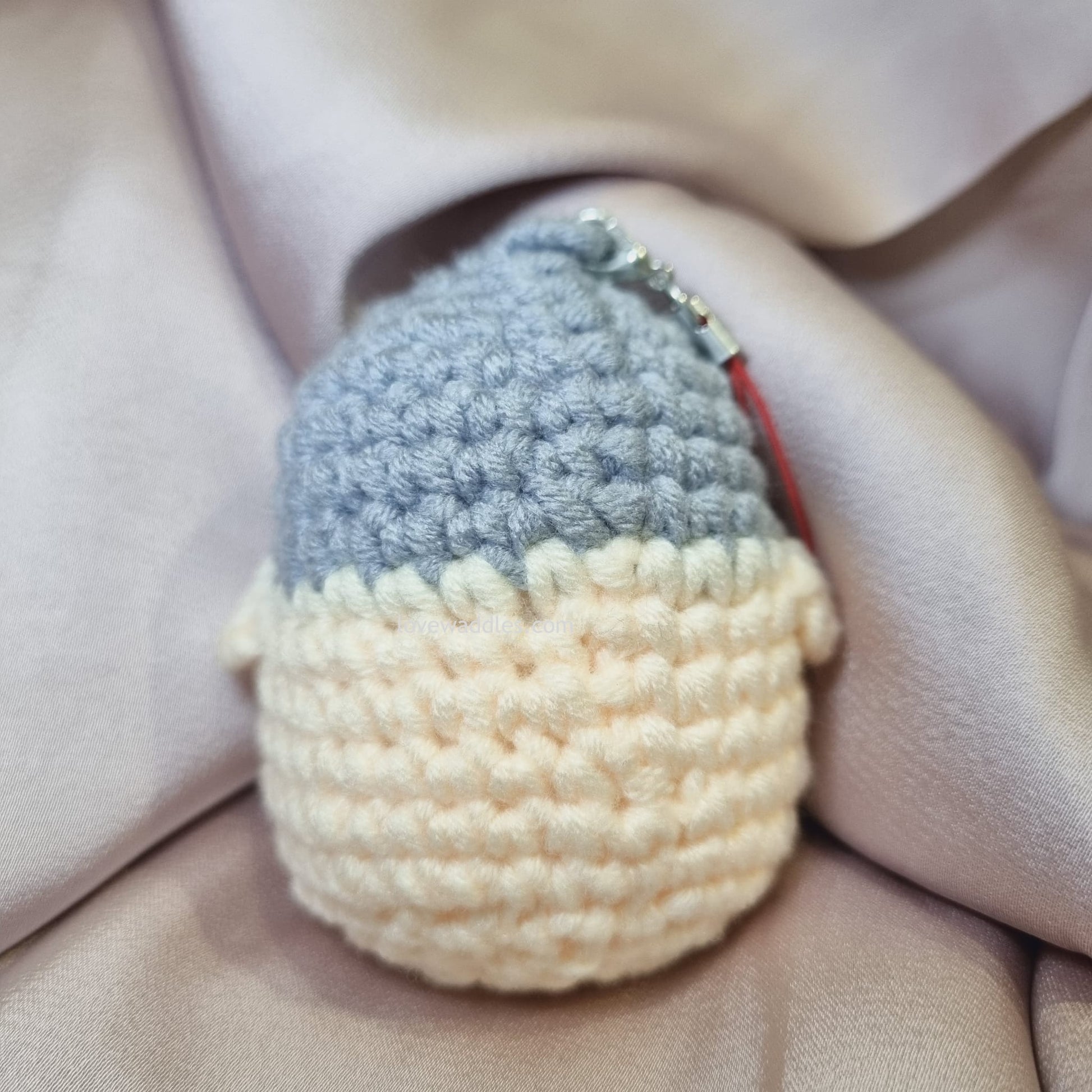 Cream crochet penguin back view 